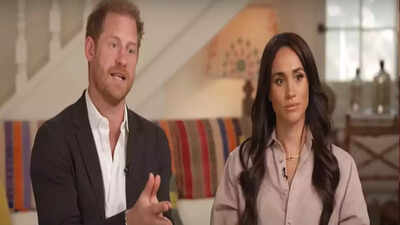 Prince Harry and Meghan Markle standing together